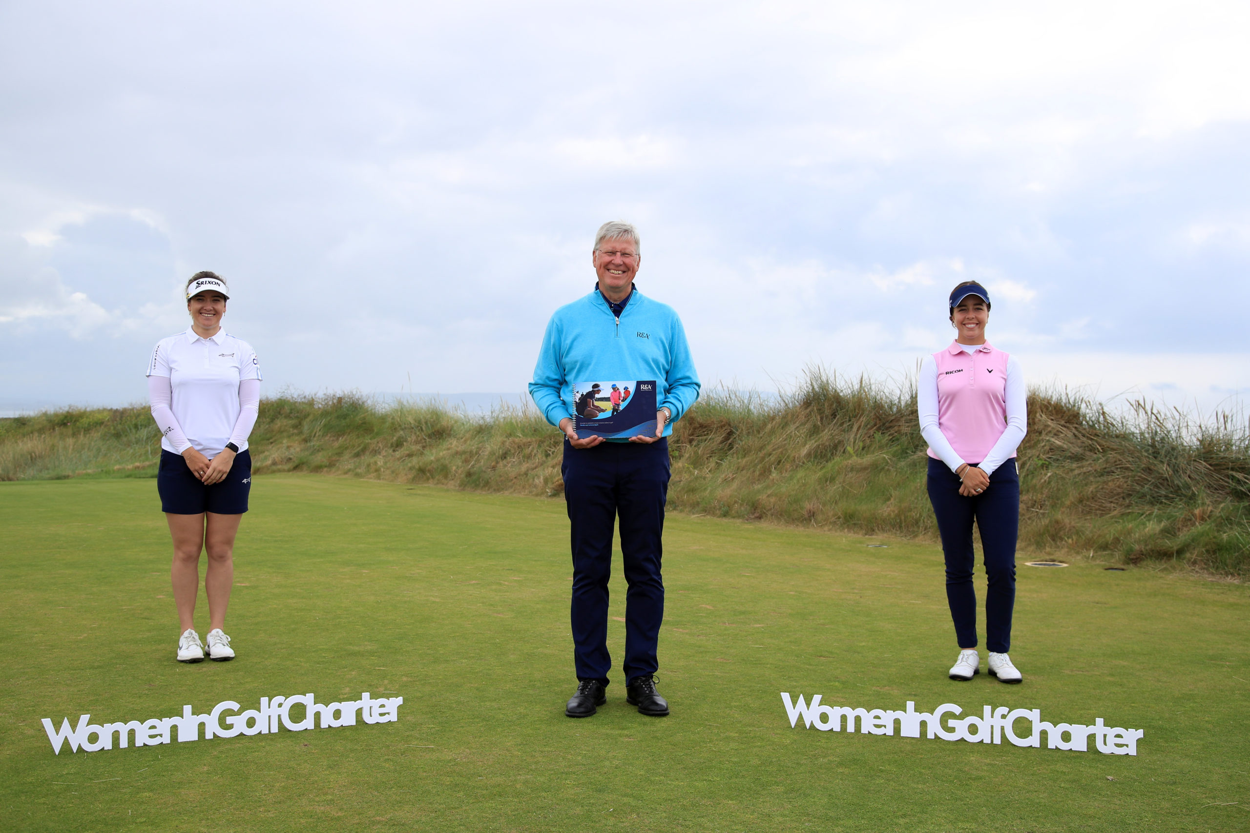 TROON, SCOTLAND - AUGUST 18: Hannah Green of Australia, Martin Slumbers, Chief Executive of R&A and Georgia Hall of England pose for a photo ahead of the AIG Women's Open 2020 at Royal Troon on August 18, 2020 in Troon, Scotland. (Photo by R&A - Handout/R&A via Getty Images)