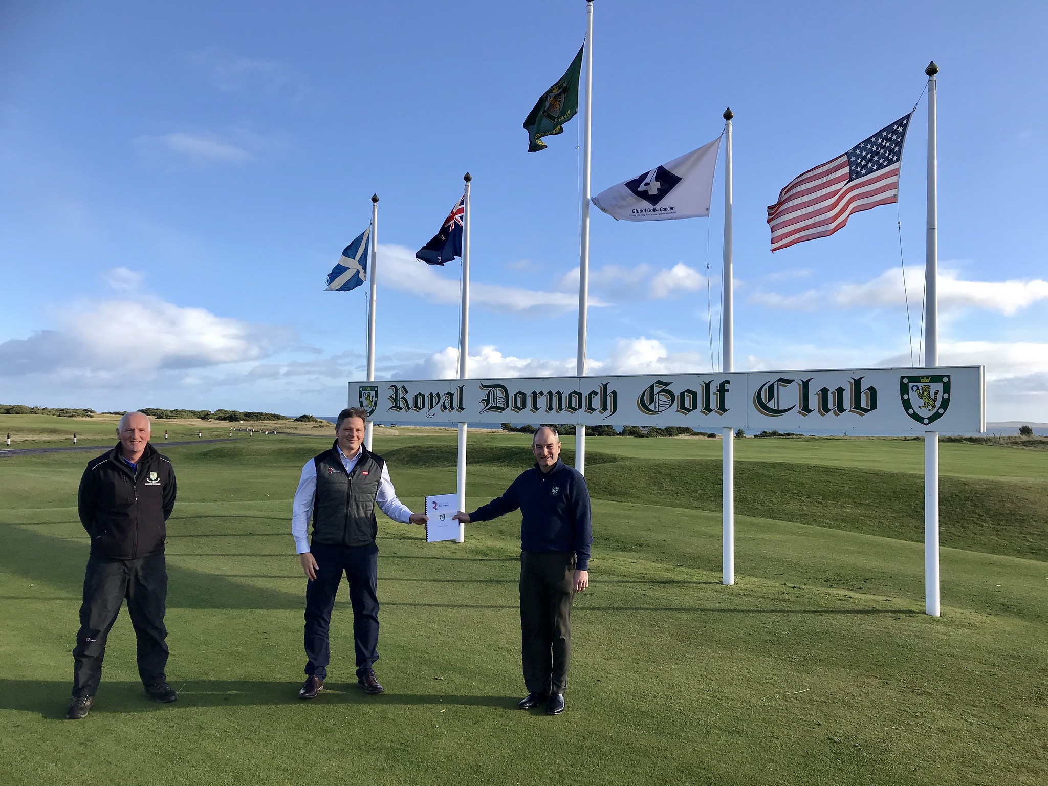 (from left) Royal Dornoch course manager Eoin Riddle, Reesink Turfcare’s Richard Green and Royal Dornoch general manager Neil Hampton