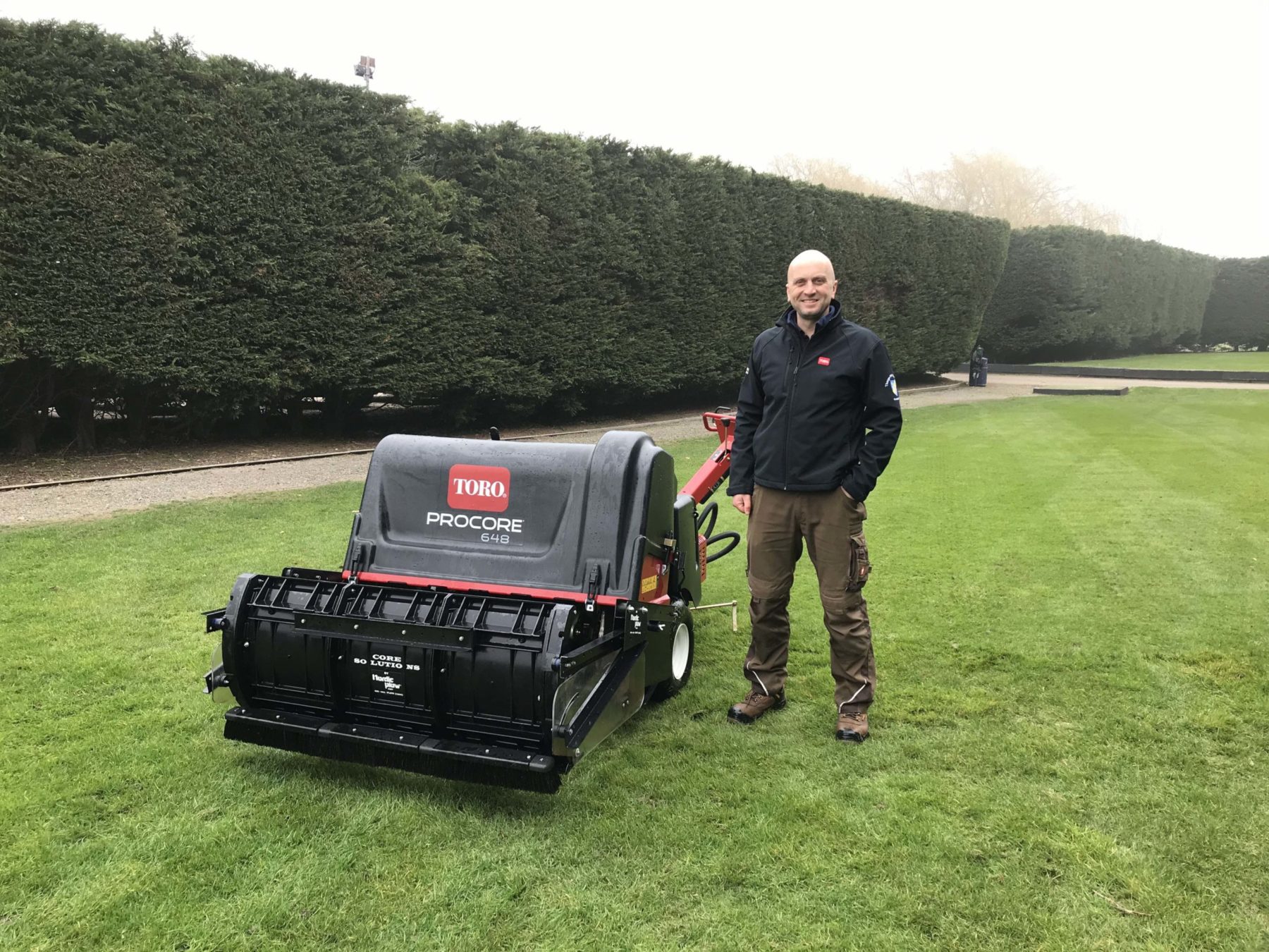 Chris Wright, course manager, with the Toro ProCore 648 and Nordic Plow Core Solutions attachment, at Thorpe Hall Golf Club