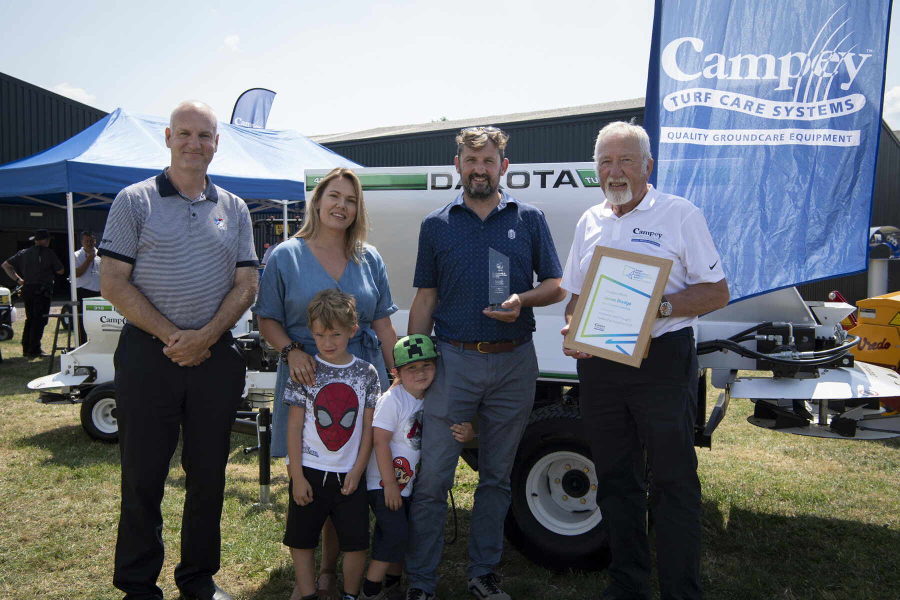 The Bledge Family of Jenny, Fletcher, Jesse and James alongside BIGGA's Jim Croxton and Campey Turf Care System's Ian Pogson