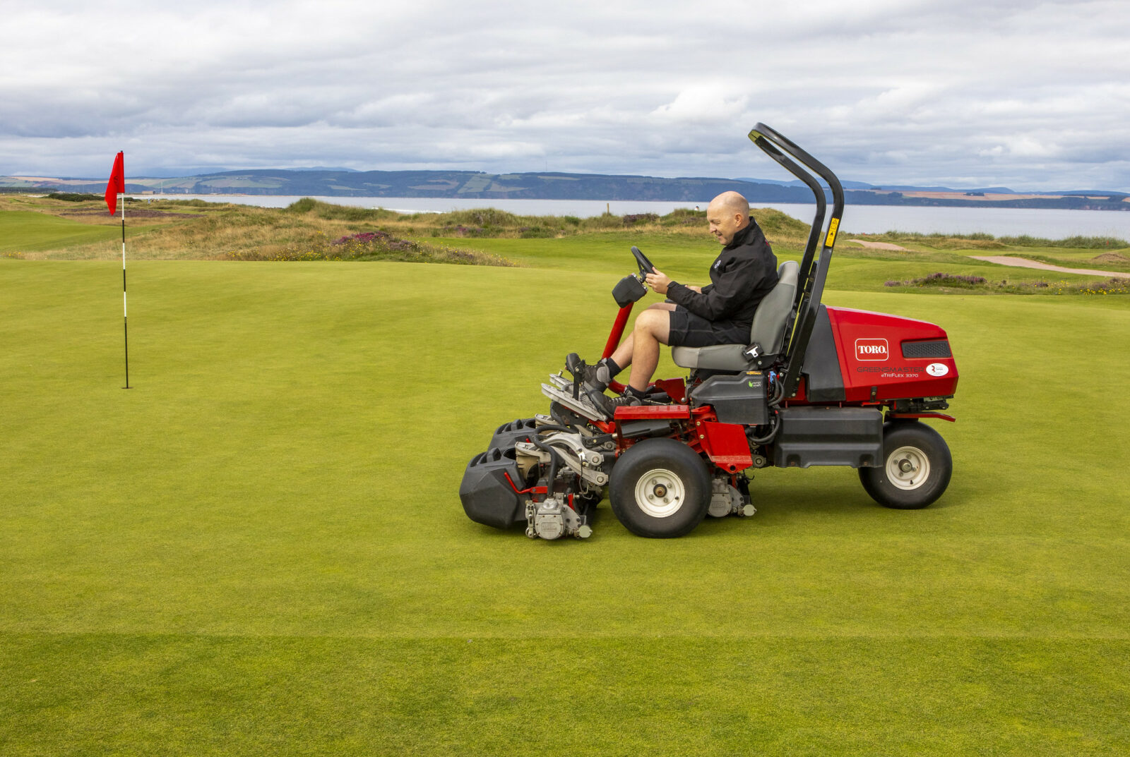 Nairn, one of the first Scottish clubs to take delivery of Toro’s Greensmaster e-Triflex 3370 greens mower, seen here with course manager Richie Ewan