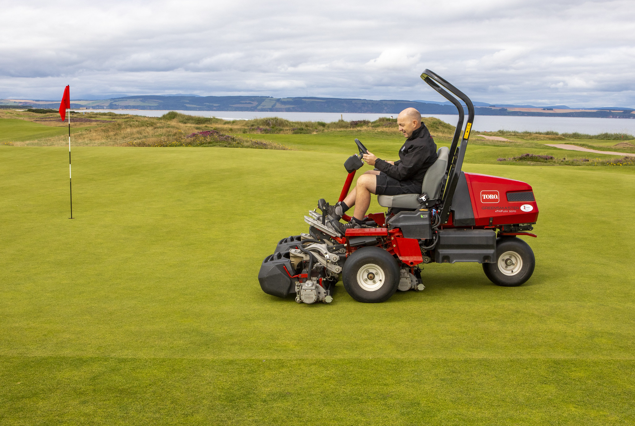 Nairn, one of the first Scottish clubs to take delivery of Toro’s Greensmaster e-Triflex 3370 greens mower, seen here with course manager Richie Ewan