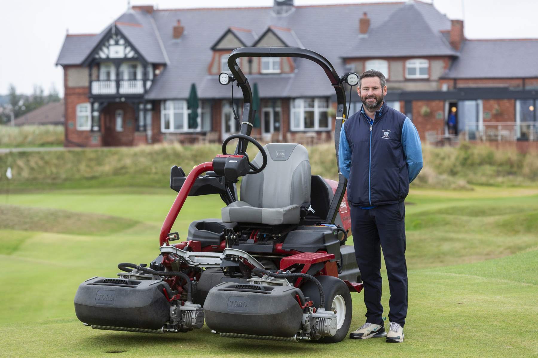 John McLoughin, course manager at Wallasey Golf Club, with Toro’s all-electric Greensmaster eTriFlex 3370.