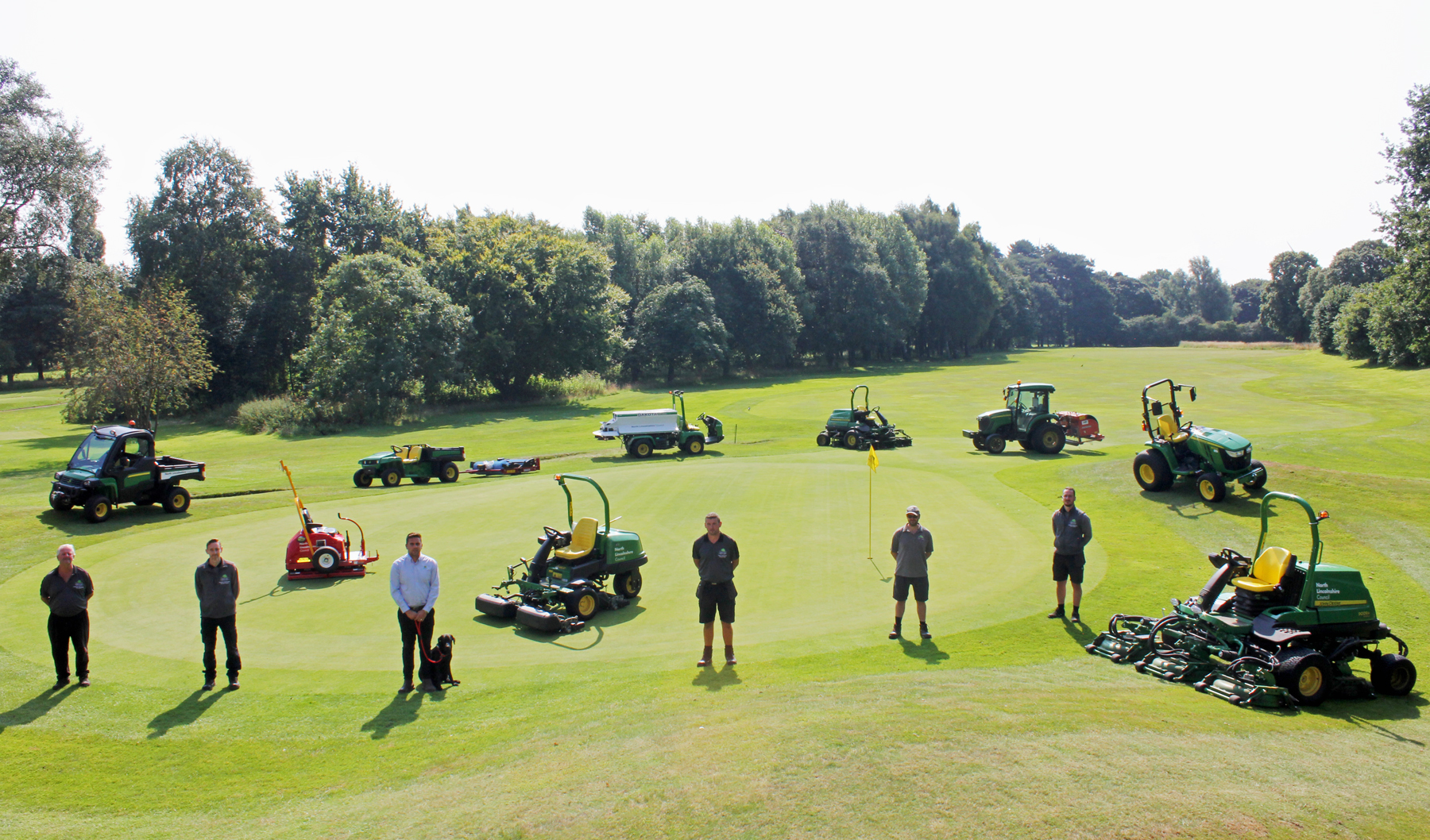 Normanby Hall Golf Club senior greenkeeper Michael Burgin (centre right) with dealer F G Adamson &amp; Son Langworth depot manager Simon Fountain and dog Ruby, plus (left to right) greenkeepers Paul Jarvis, Richard Parsons, Gareth Hallberg and Jordan Quibell