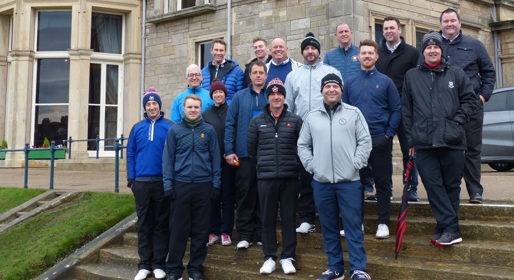 The delegates standing in front of The R&A clubhouse