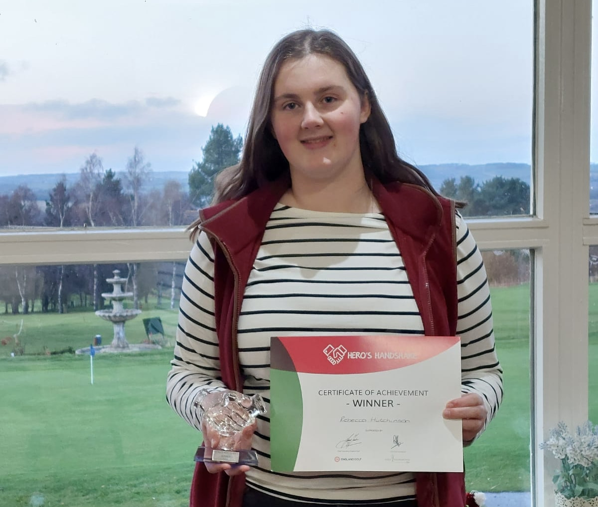 Rebecca Hutchinson with her Hero's Handshake award