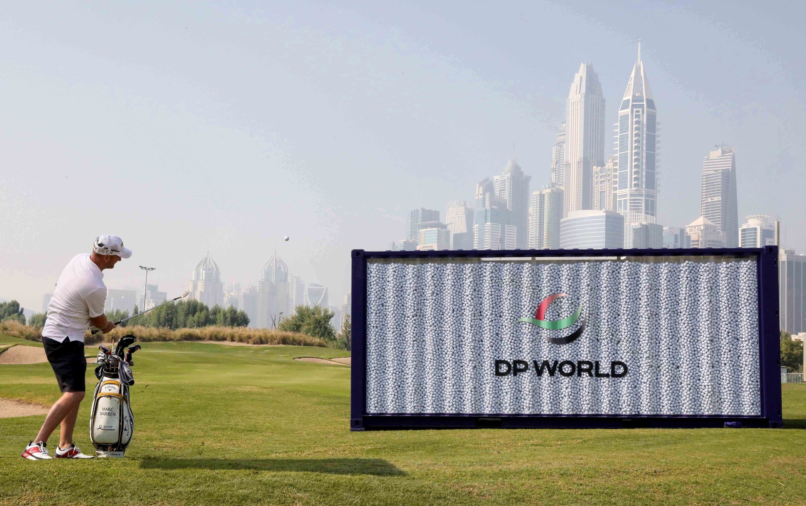 Callaway Staff player Marc Warren got the collection going by chipping balls into the container at the Slync.io Dubai Desert Classic