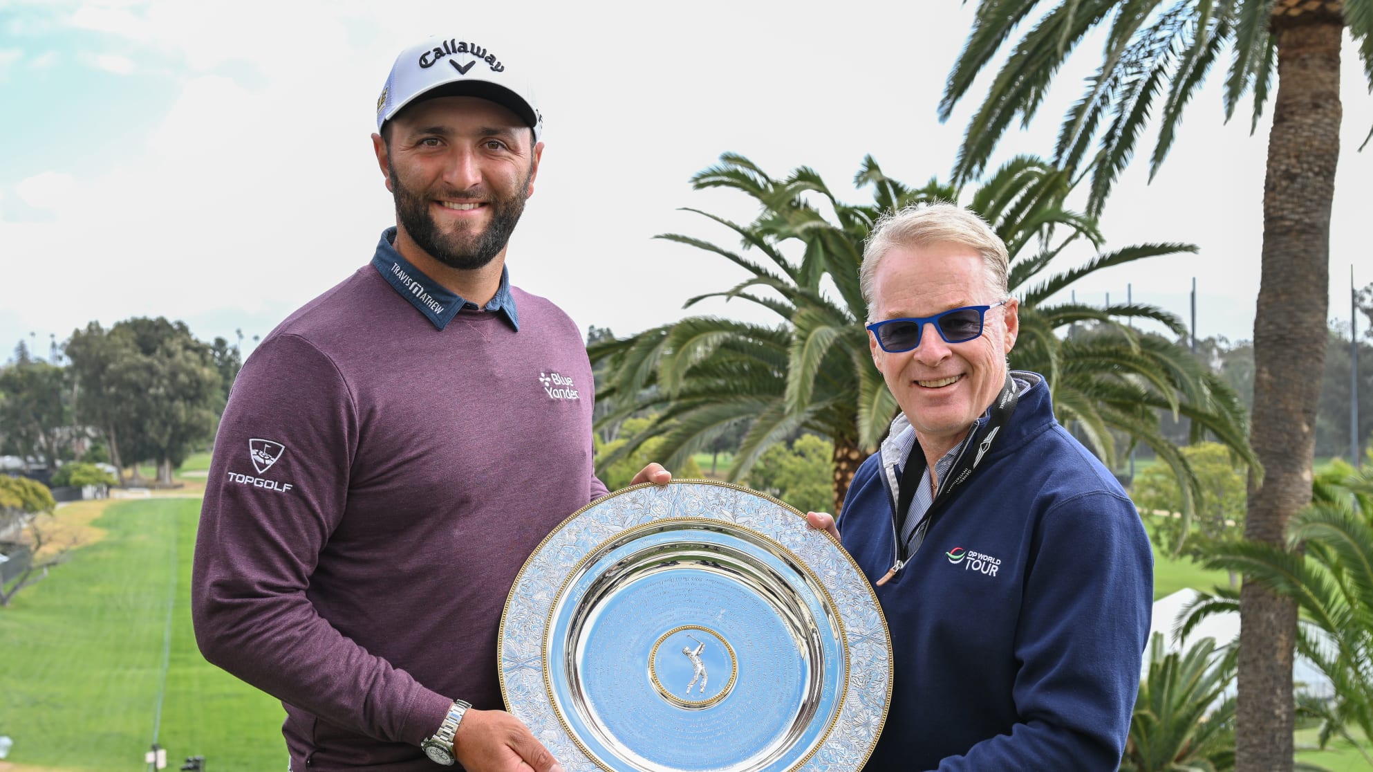 Jon Rahm receives the Seve Ballesteros Award from European Tour group chief executive Keith Pelley