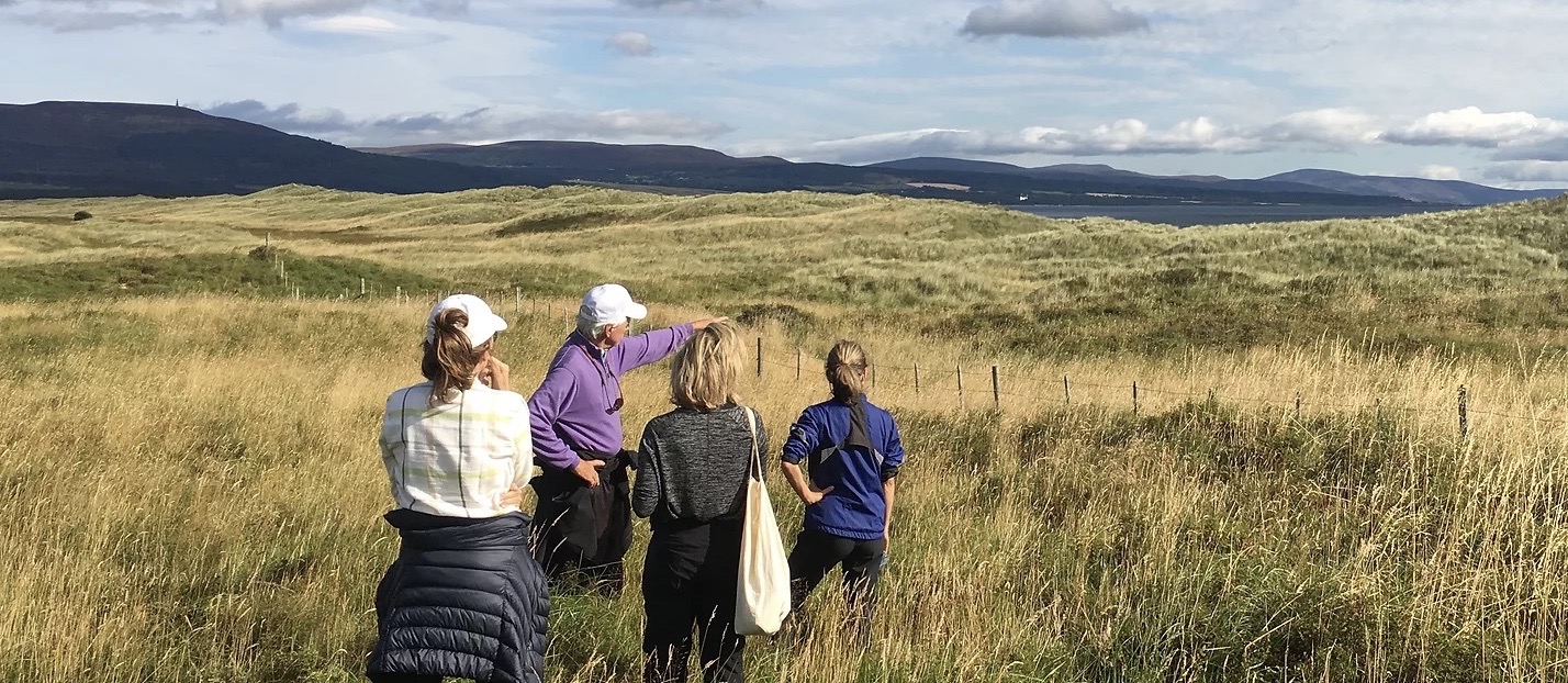 Golf course designer Bill Coore with a group of visitors at the site of the proposed Coul Links course