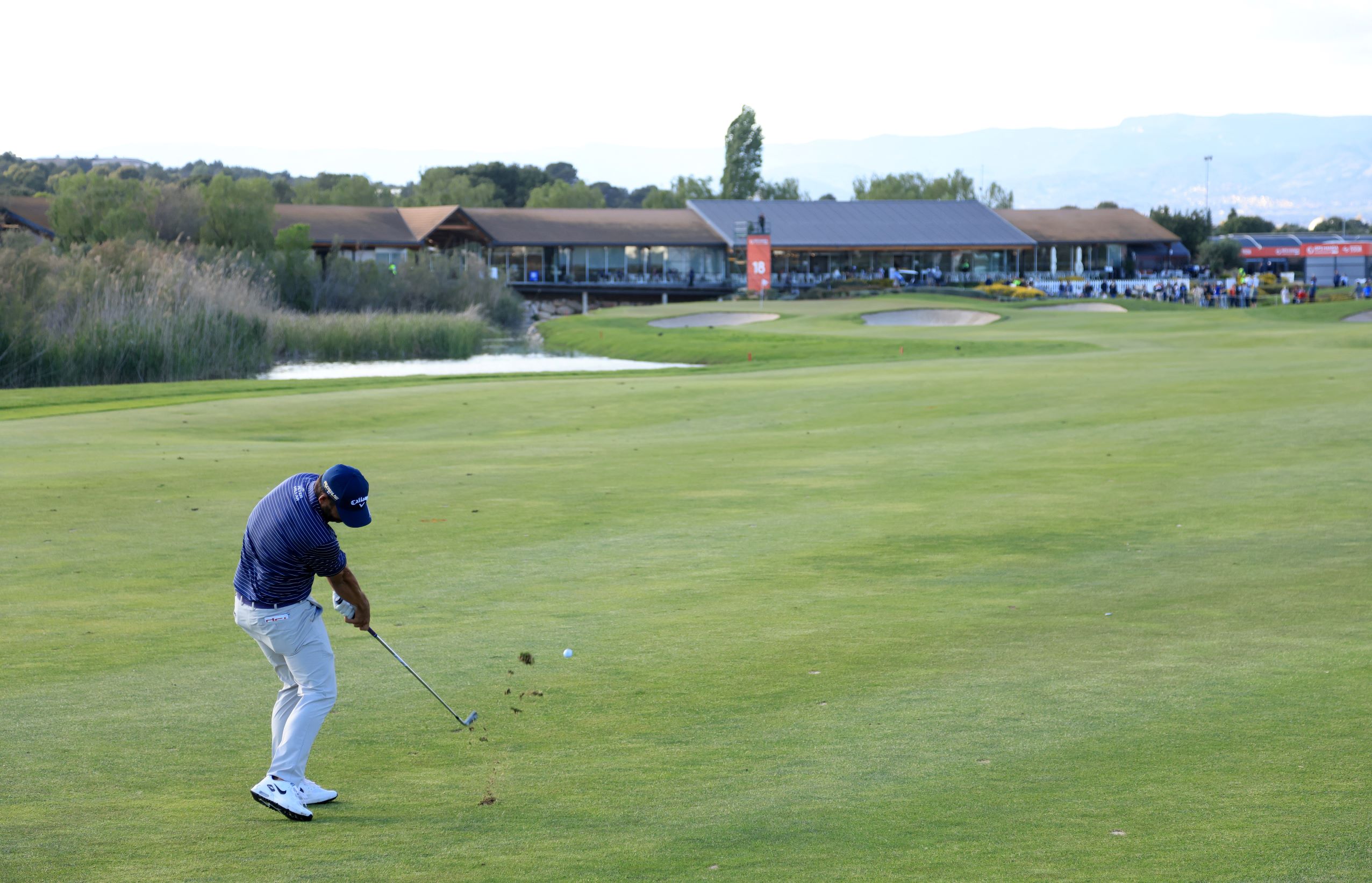 Spain's Pablo Larrazábal plays his approach to the final green on the Lakes course en route to a closing 62 and victory at the DP World Tour's ISPS Handa Championship