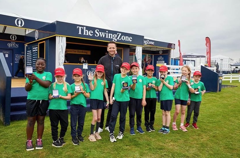 Nick Dougherty with Golf Foundation school pupils at The Open in 2021