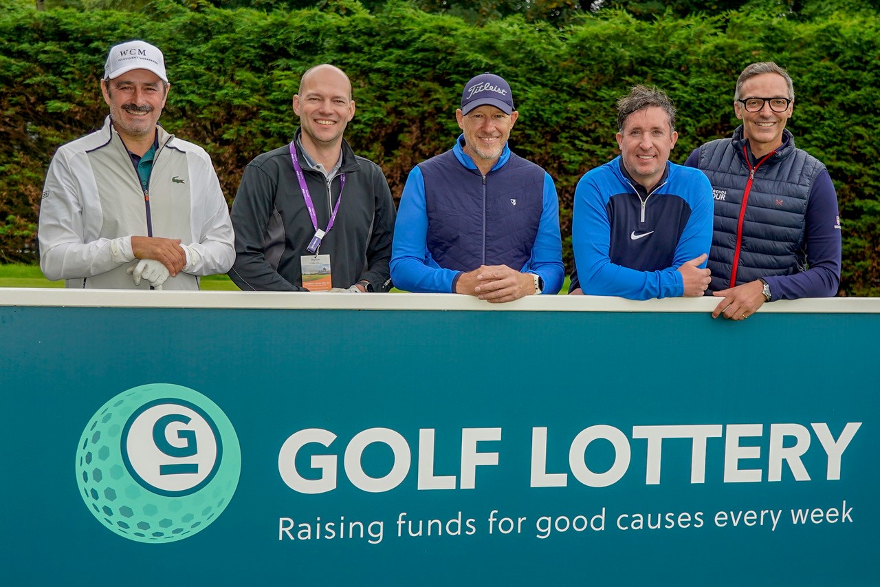 Golf Lottery winner Jonathan Roberts (second left) pictured with (from left to right) Jean van de Velde, Ryan Howsam, Robbie Fowler and Keith Mitchell