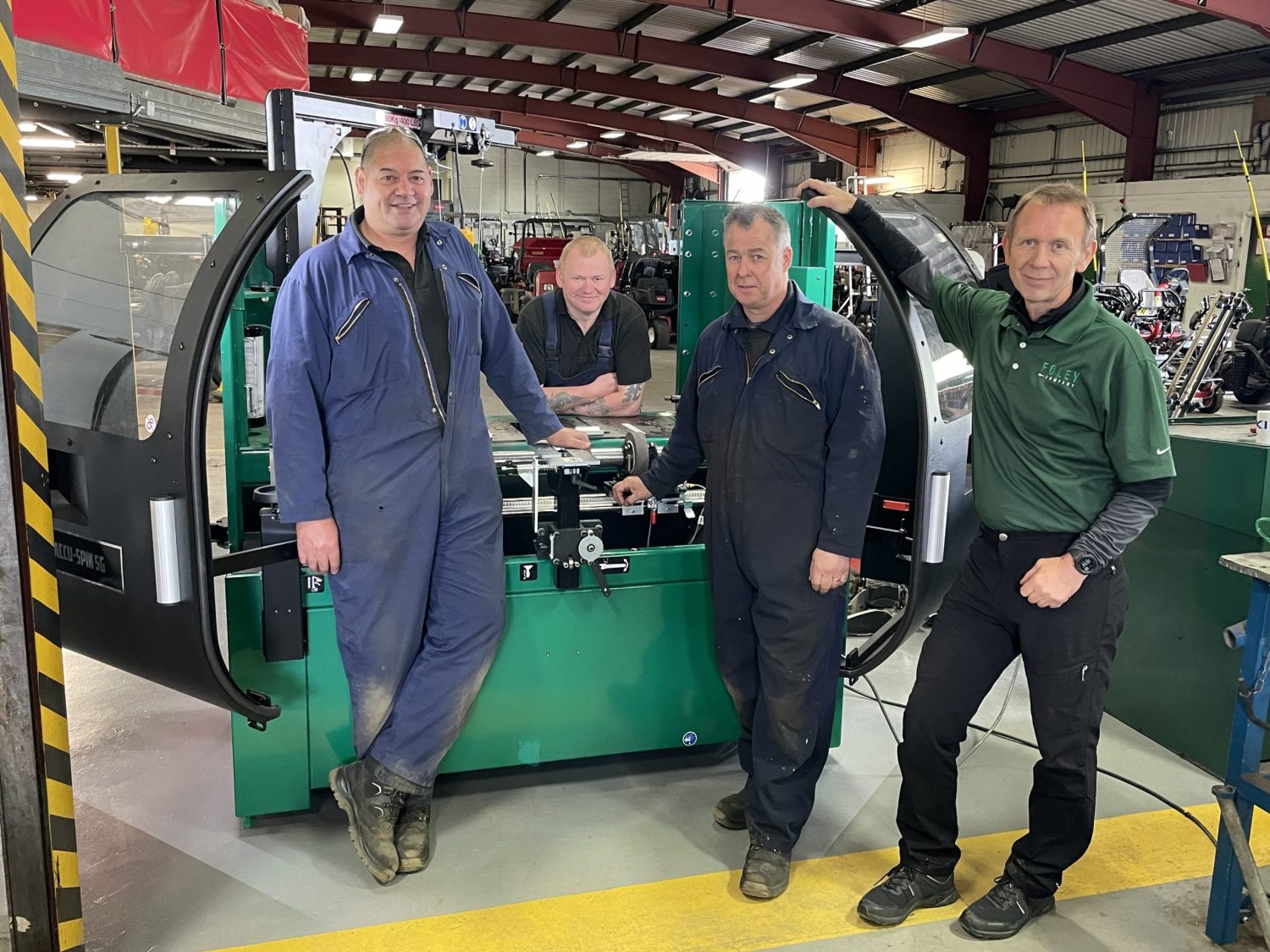 Lani Togi St Andrews workshop manager (left) and team with Ian Robson from Prosport UK (right)