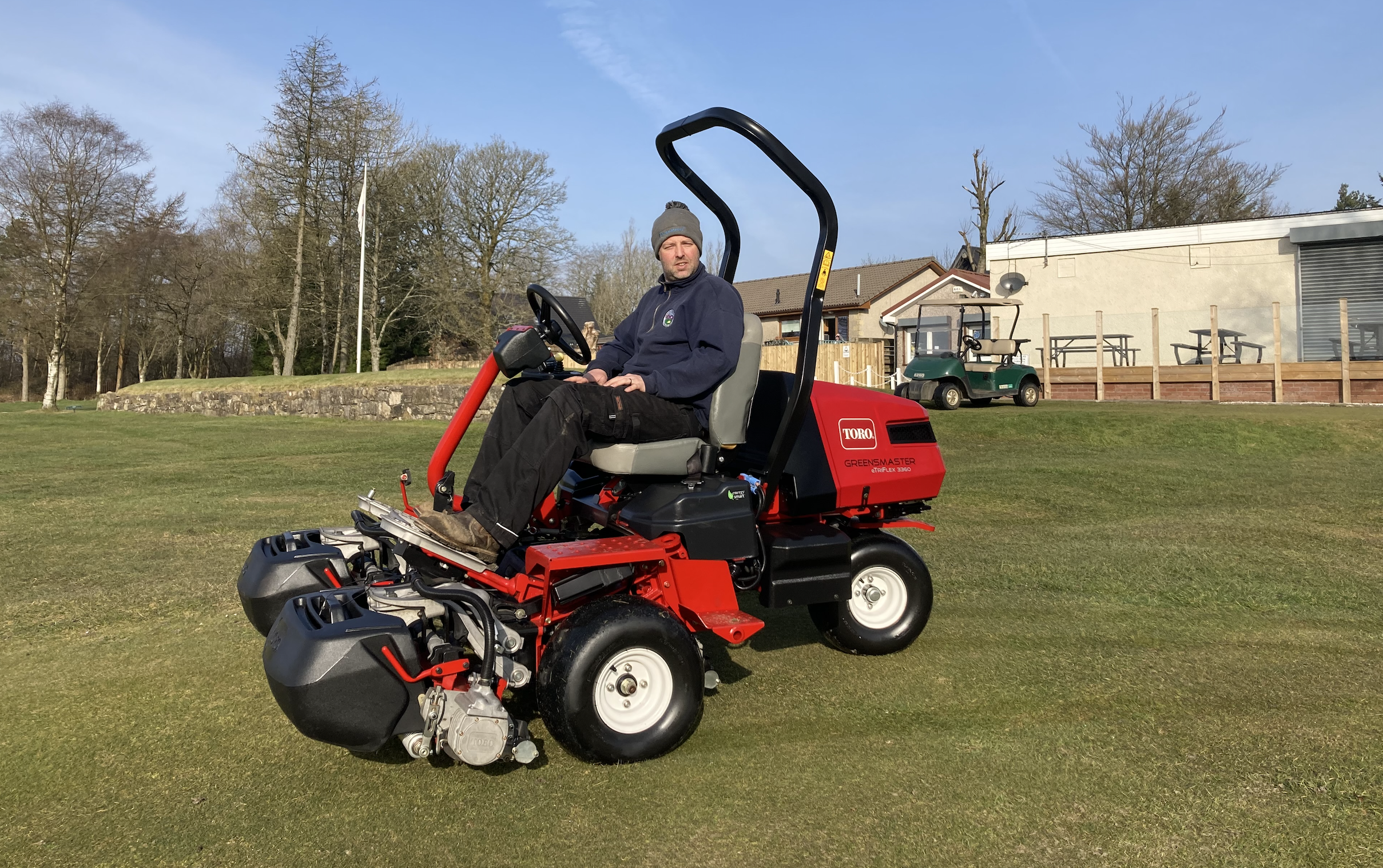hotts Golf Club course manager Andrew Kirk with the Greensmaster eTriFlex 3360 mower