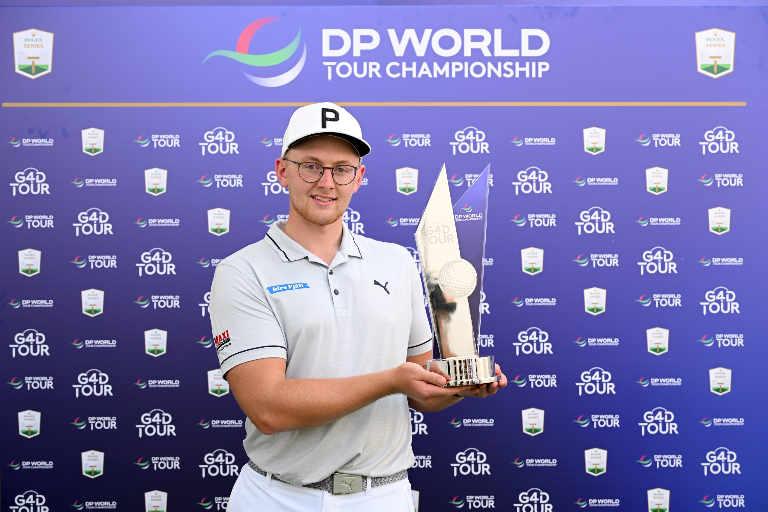 Rasmus Lia of Sweden celebrates with the trophy after winning the G4D Tour Seriers Finale @ DP World Tour Championship