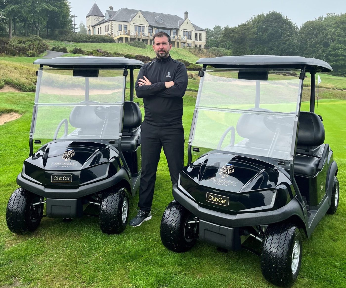 Ayden Roberts-Jones with two of the new Club Car Tempo buggies featuring Visage technology