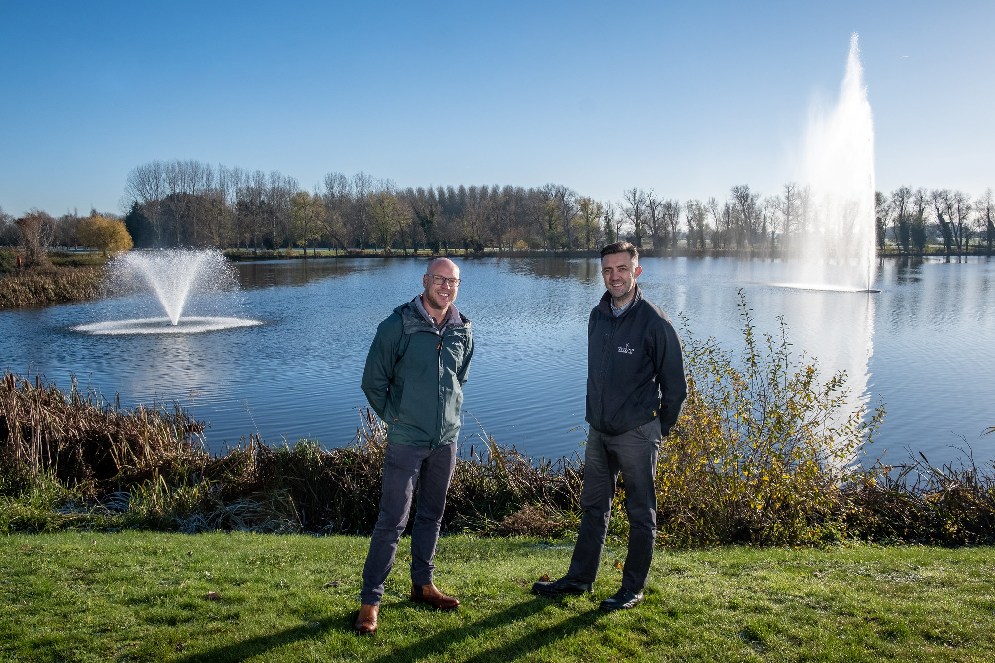 Wyboston Lakes Resort has chosen two Otterbine fountains to complement natural beauty of two lakes, pictured here, with Simon Coleman, deputy maintenance manager, at the resort, right, and Simon Powell from Reesink