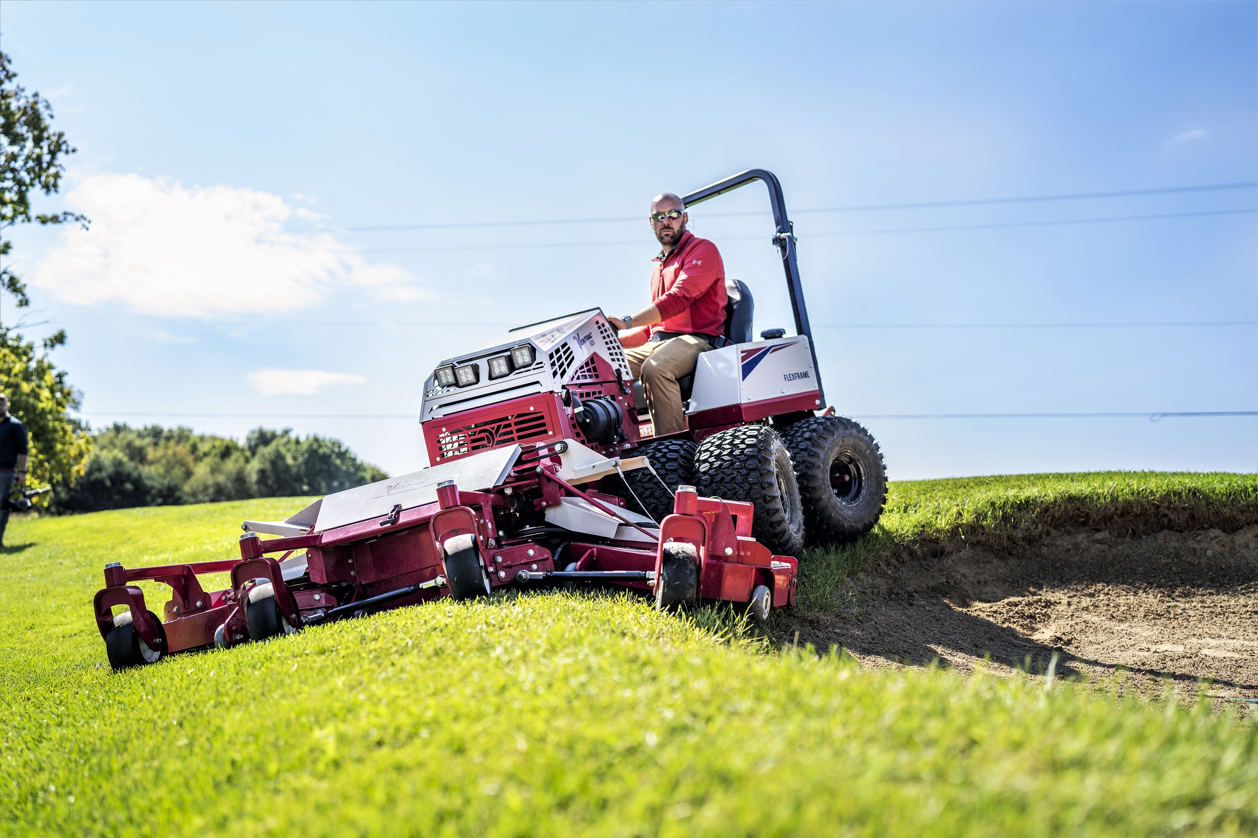 The versatile Ventrac 4520 all-terrain compact tractor with Contour mowing deck