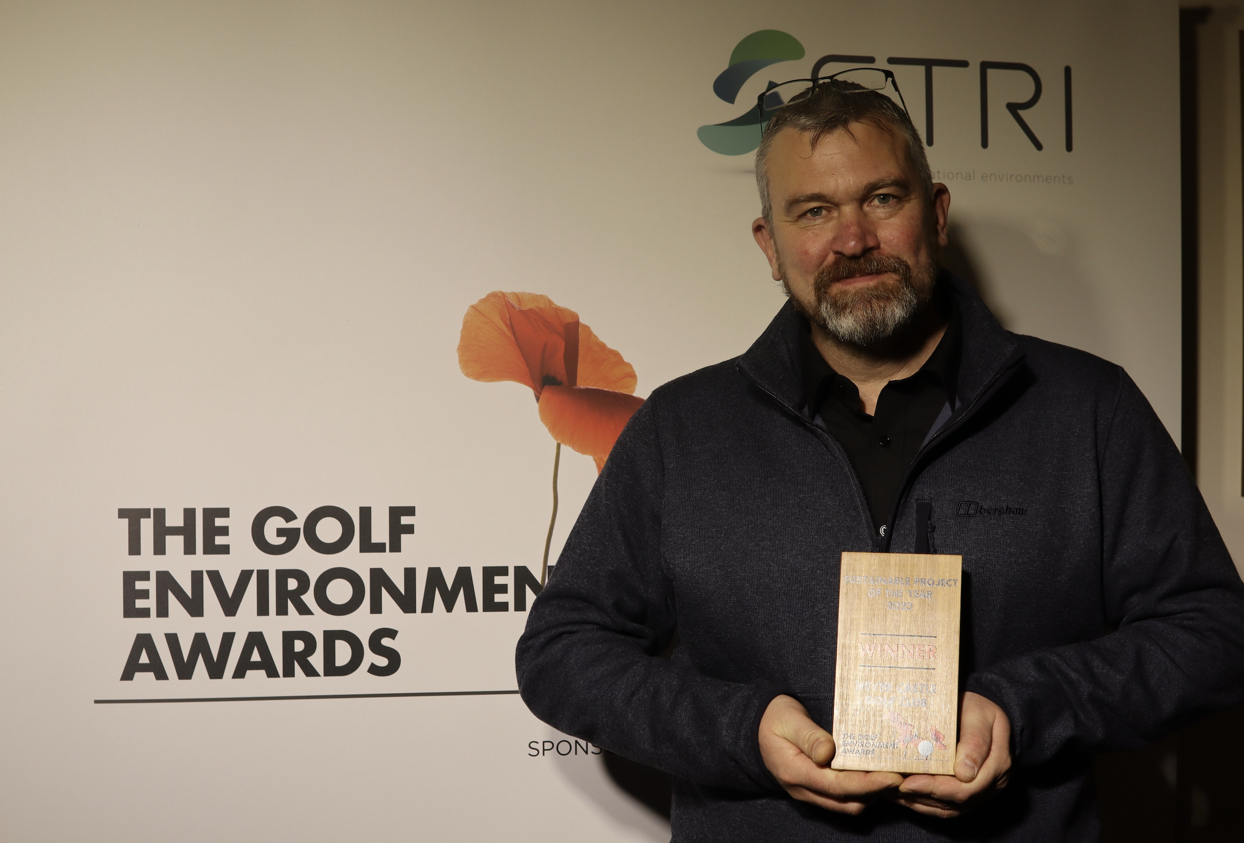 Hever Caslte Golf's head greenkeeper Rob Peers with the award