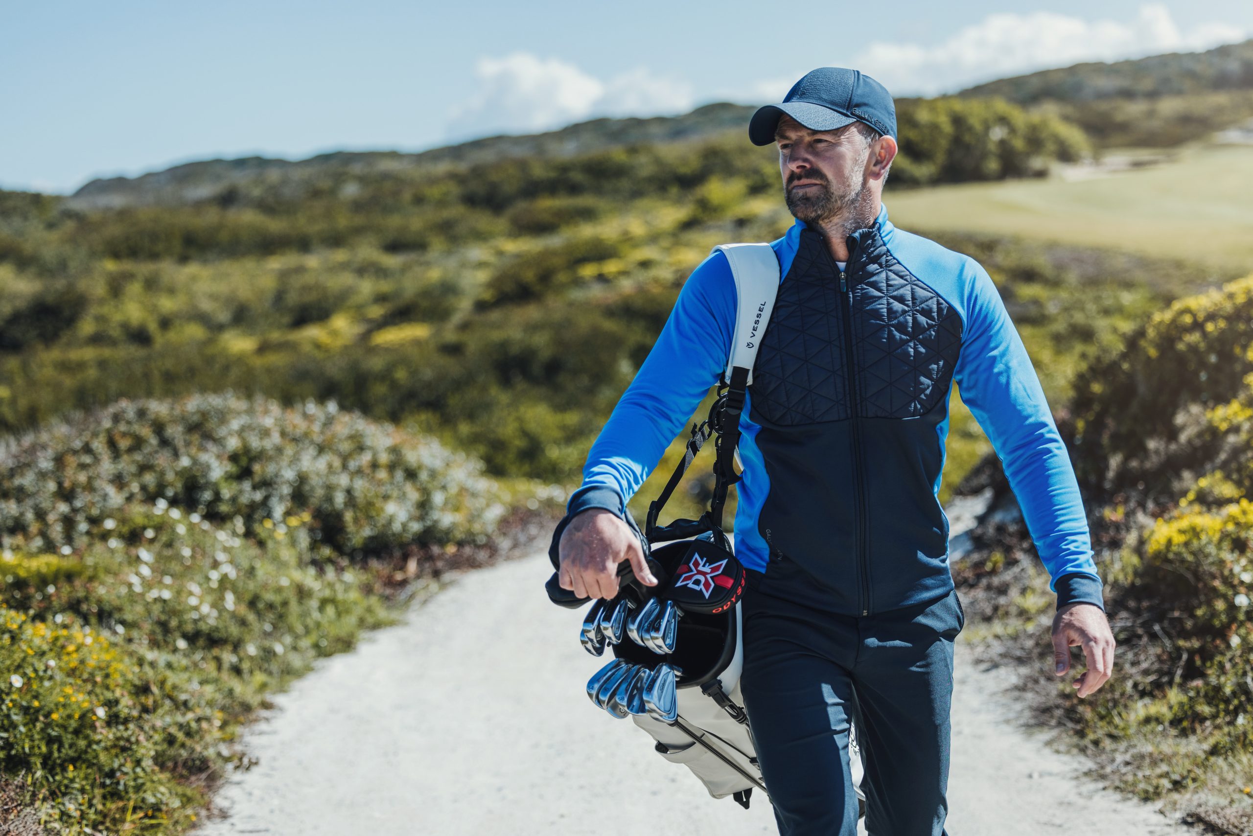 The DEXTER half-zip jumper is a key piece in Galvin Green's latest apparel collection