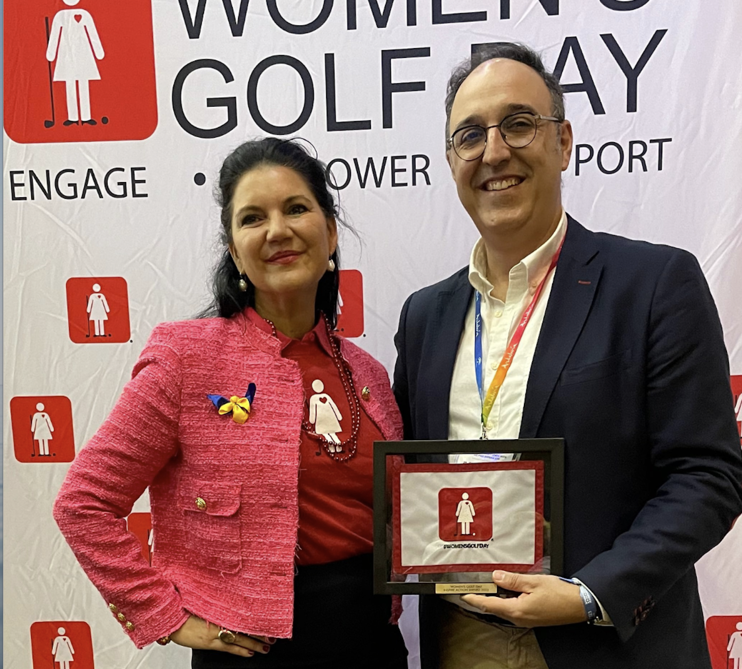 Women's Golf Day founder Elisa Gaudet presented an Inspire Action Award to Vincent Rubio, president of Finca Cortesin, for its support of women's golf at all levels