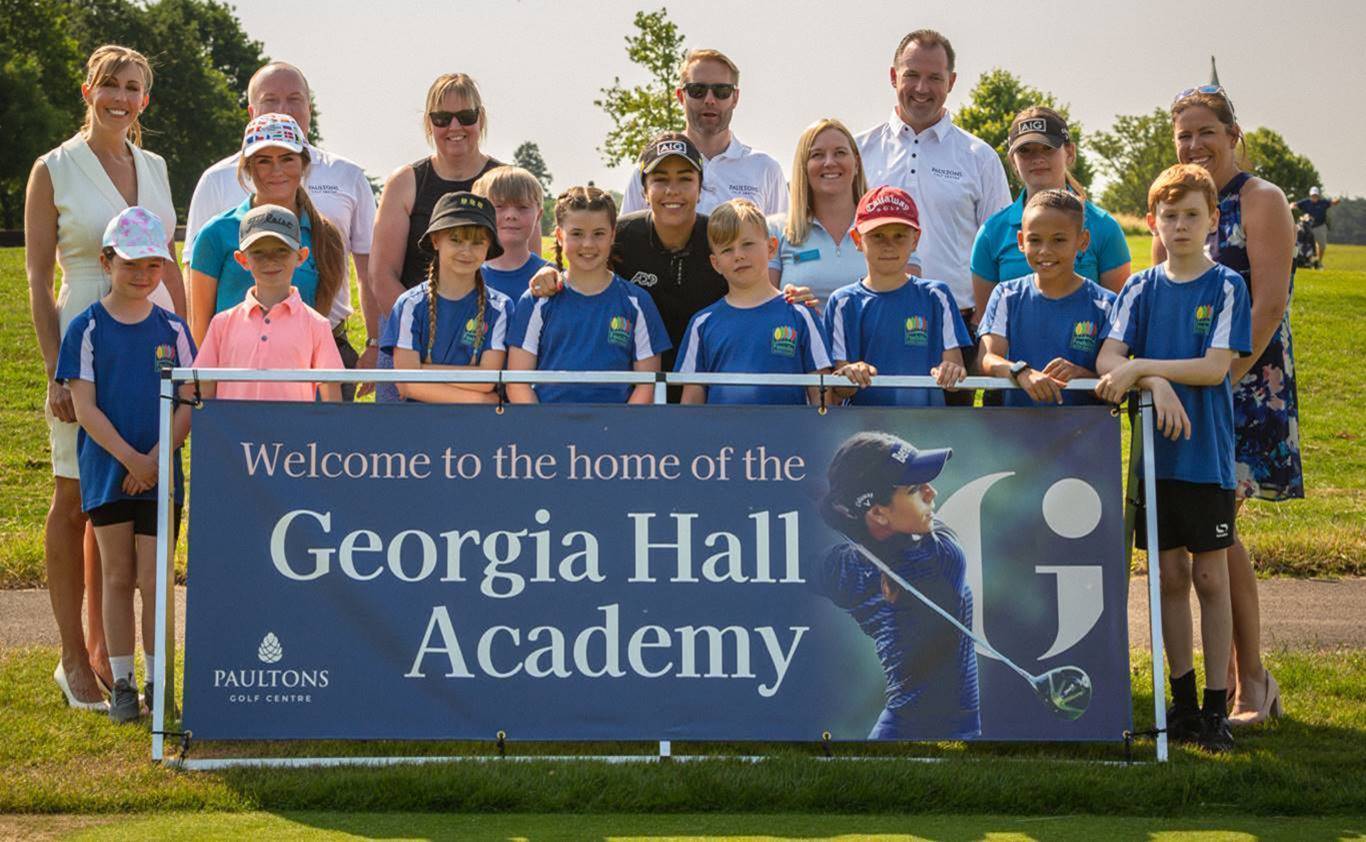 Georgia Hall with local kids at the launch of her new academy  at Paultons Golf Centre in Hampshire