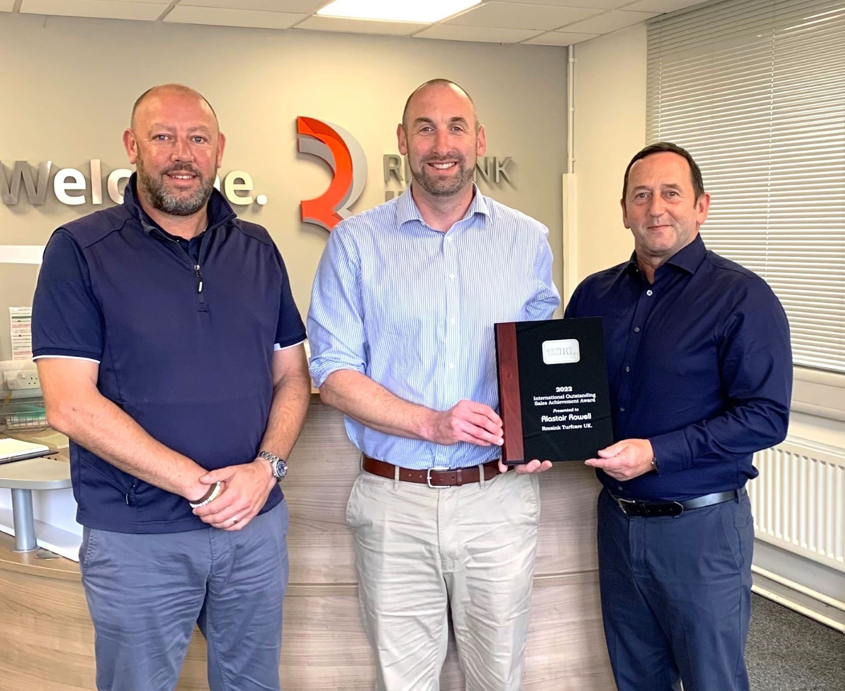 from left: John Mooney, from the Toro Company, presents Jon Cole and Alastair Rowell, both from Reesink UK, with the Toro 2022 International Outstanding Sales Achievement Award