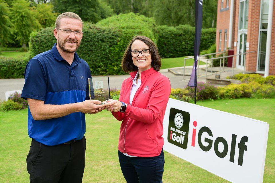 Tournament winner Dan Turton with iGolf Manager Claire Hodgson