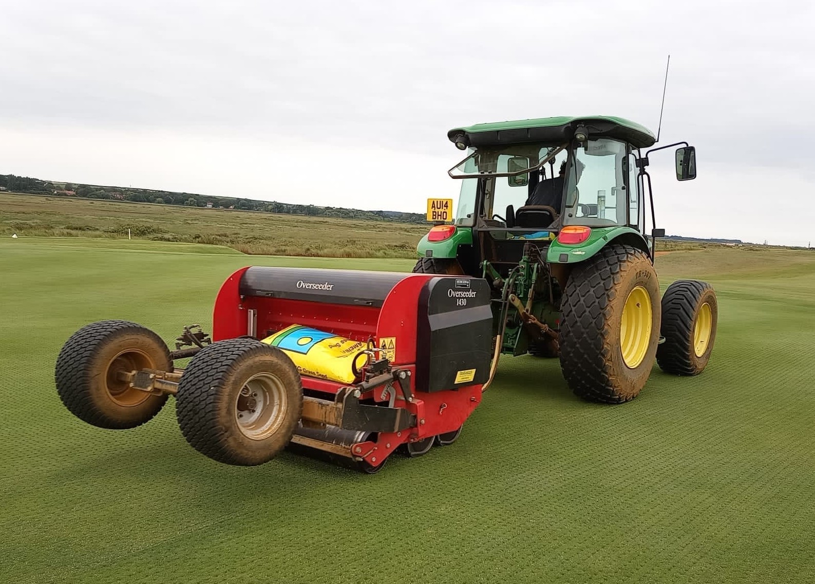 A Redexim overseeder in action at Royal West Norfolk GC