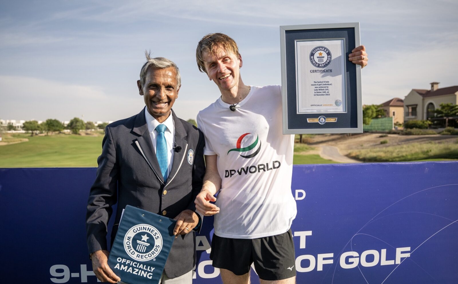 Luke Willlett celebrates setting a new world record ifor the fastest 9-hole round last year
