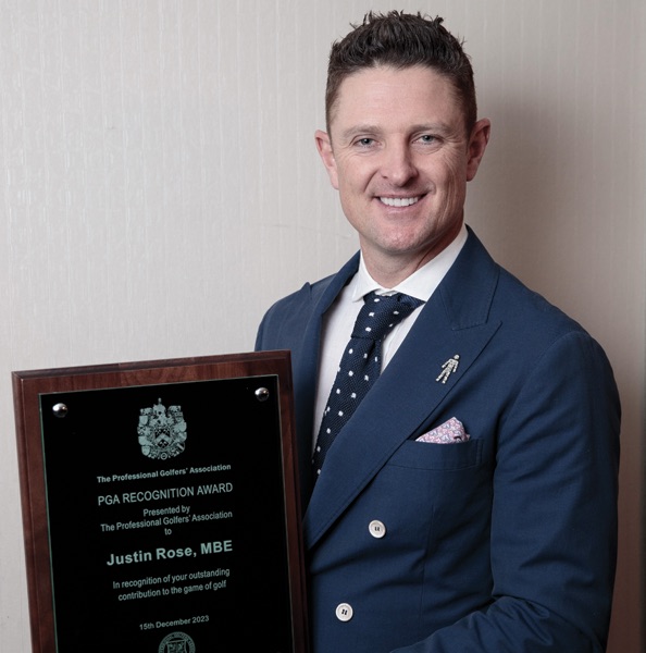 Justin Rose with his award