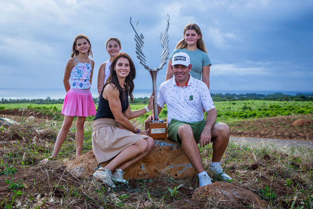 Louis Oosthuizen with his family after winning the AfrAsia Bank Mauritius Open at La Réserve Golf Links, a course he co-designed