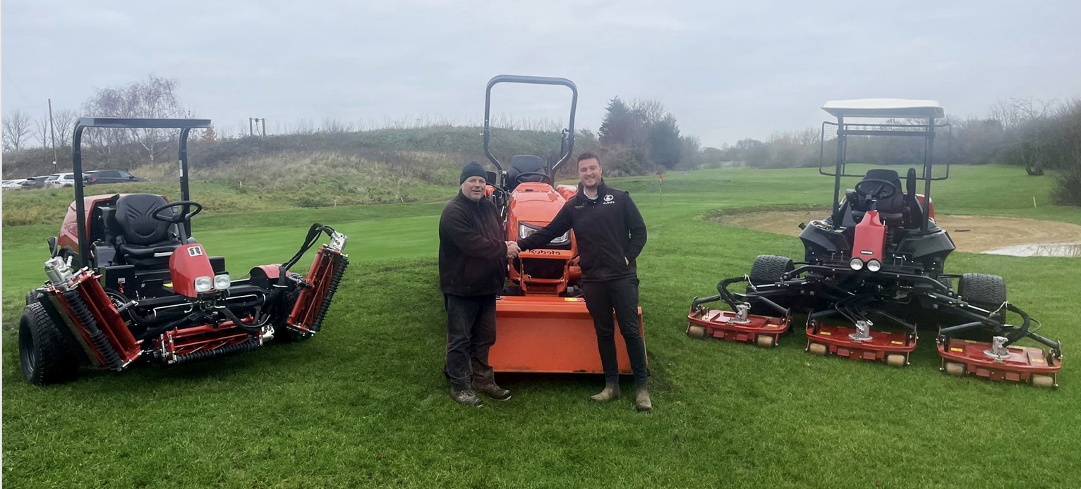Doug Mackison (left) pictured with Luke Farrow of 
George Browns Ltd and a selection of his machinery fleet
