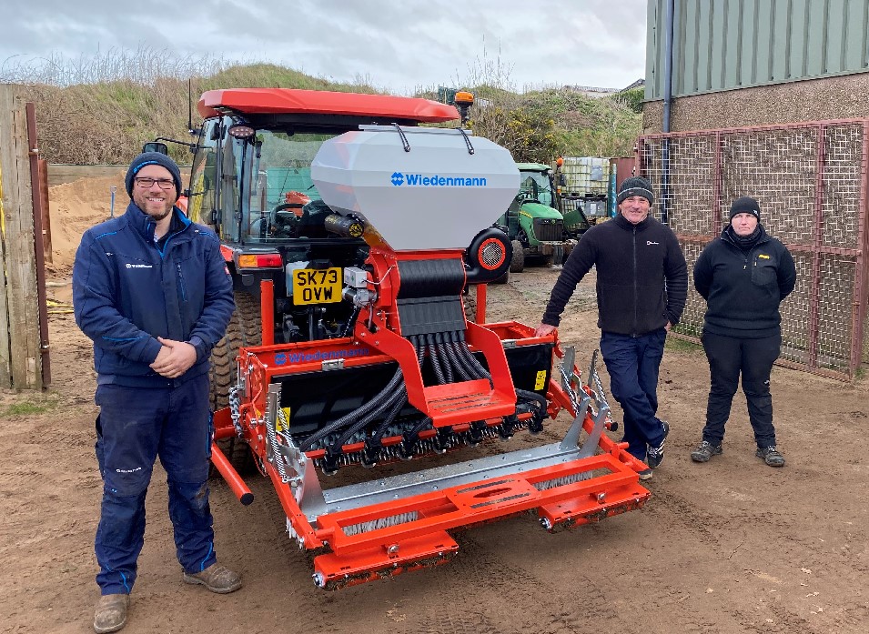 Wiedenmann UK’s Andy Kerr, left ,with Des Kerr, centre, and greenkeeper Sue Glen