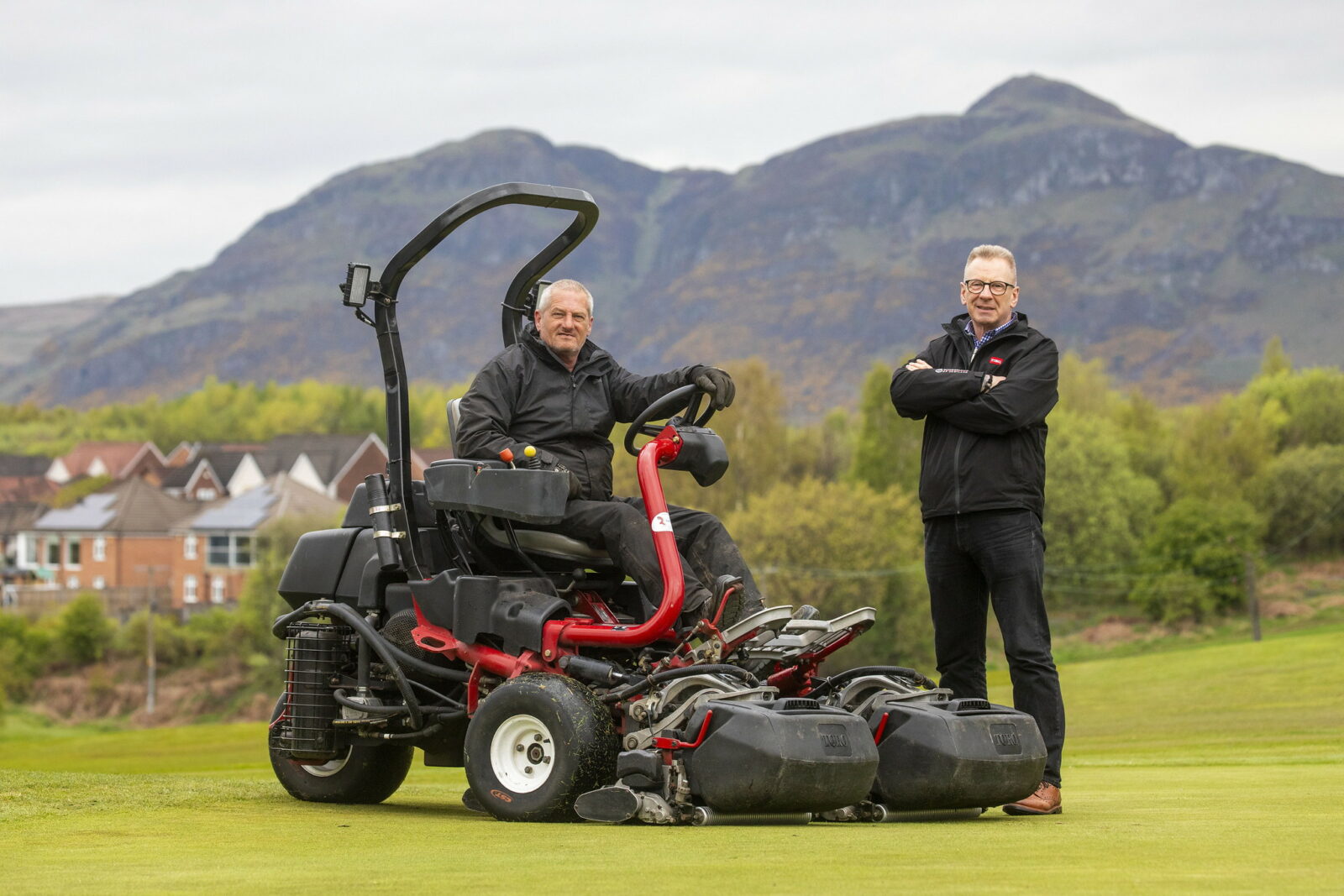 Harvey Harrower, Braehead Golf Club head greenkeeper, seated on the Toro Greensmaster TriFlex 3420, with Reesink’s Neil Mackenzie.