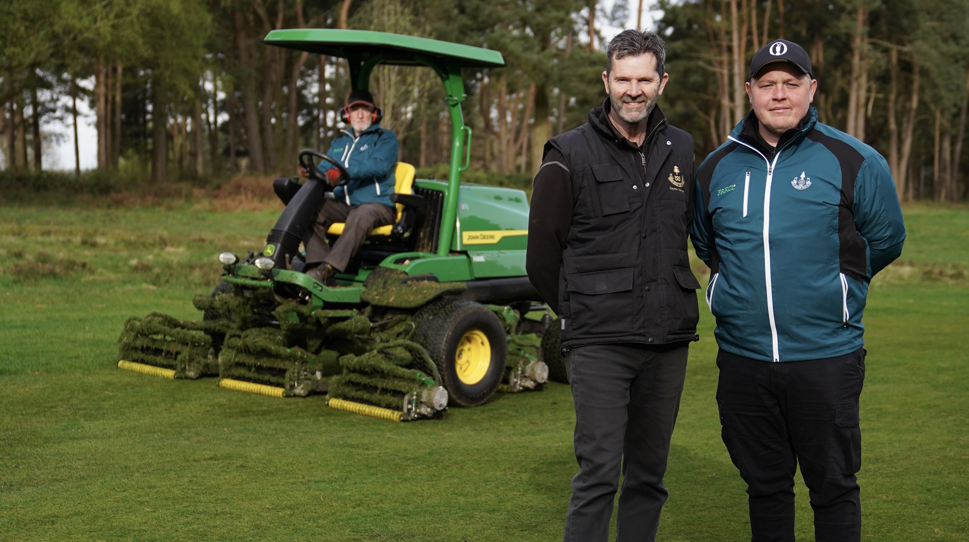 Steve Mucklow (left) and Luke Sheldon with one of the new John Deere fairway mowers
