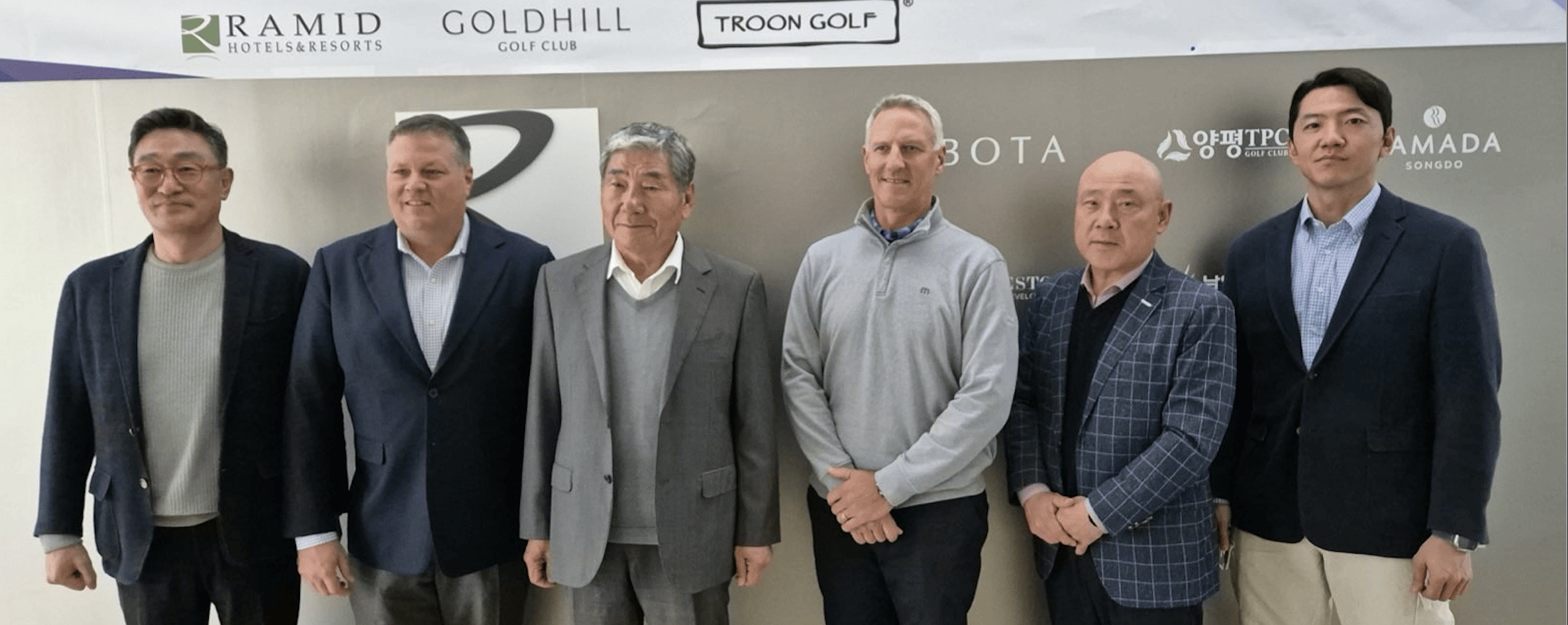Members of Gold Hills CC board and Troon Golf at the signing of the management contract