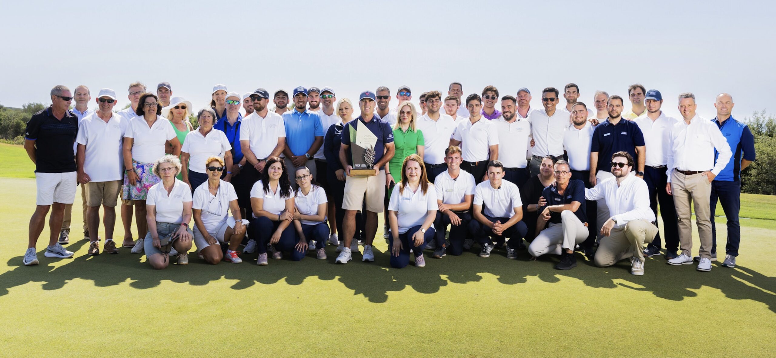 Tournament winner Clark Dennis with Costa Navarino's tournament staff members