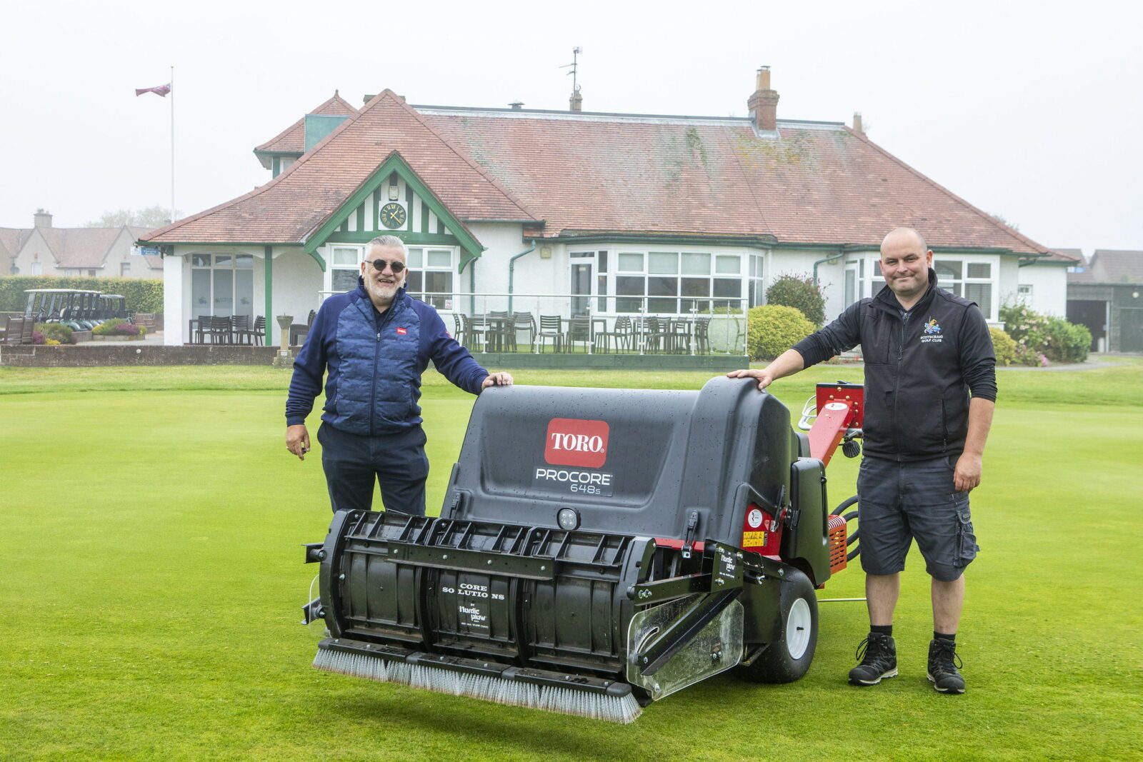 Toro Procore 648s at Scotscraig Golf Club with Darren McKenna, Course Manager, on right, and Reesink’s John Rankin. ProCore is fitted with Core Solutions Collector also available from Reesink.