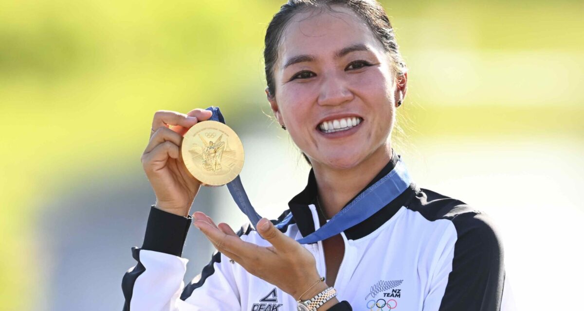 Lydia Ko proudly displays her gold medal (Photo by Tracy Wilcox/PGA TOUR/IGF)