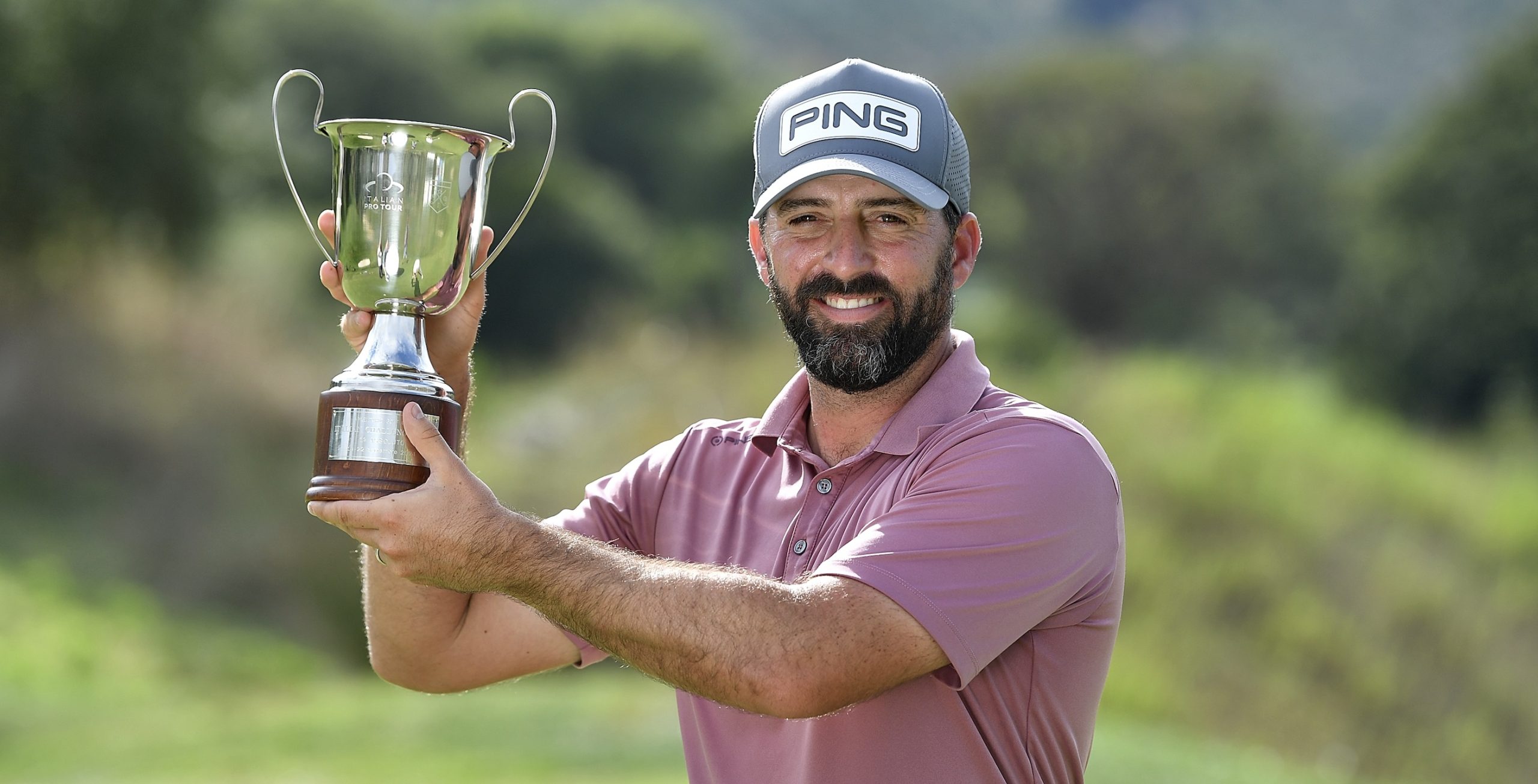 John Parry lifts the Italian Challenge Open trophy 