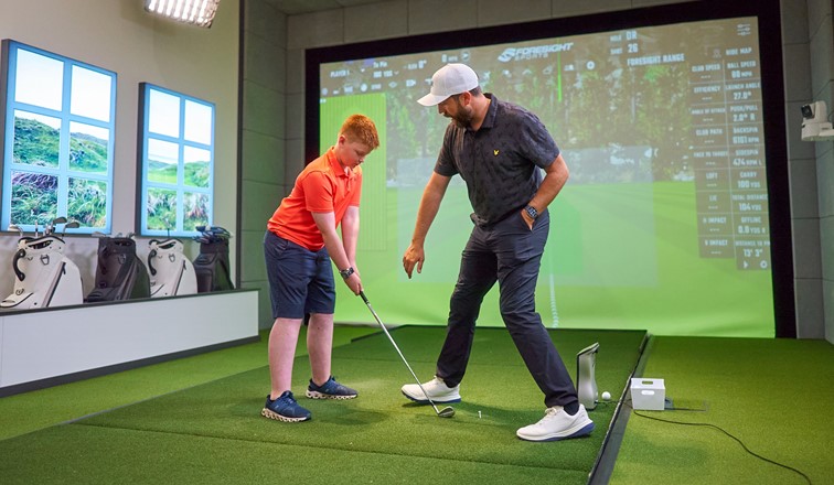 Rick Shiels gives fan Jack,13, some pointers during his memorable visit to the H.I.T studio