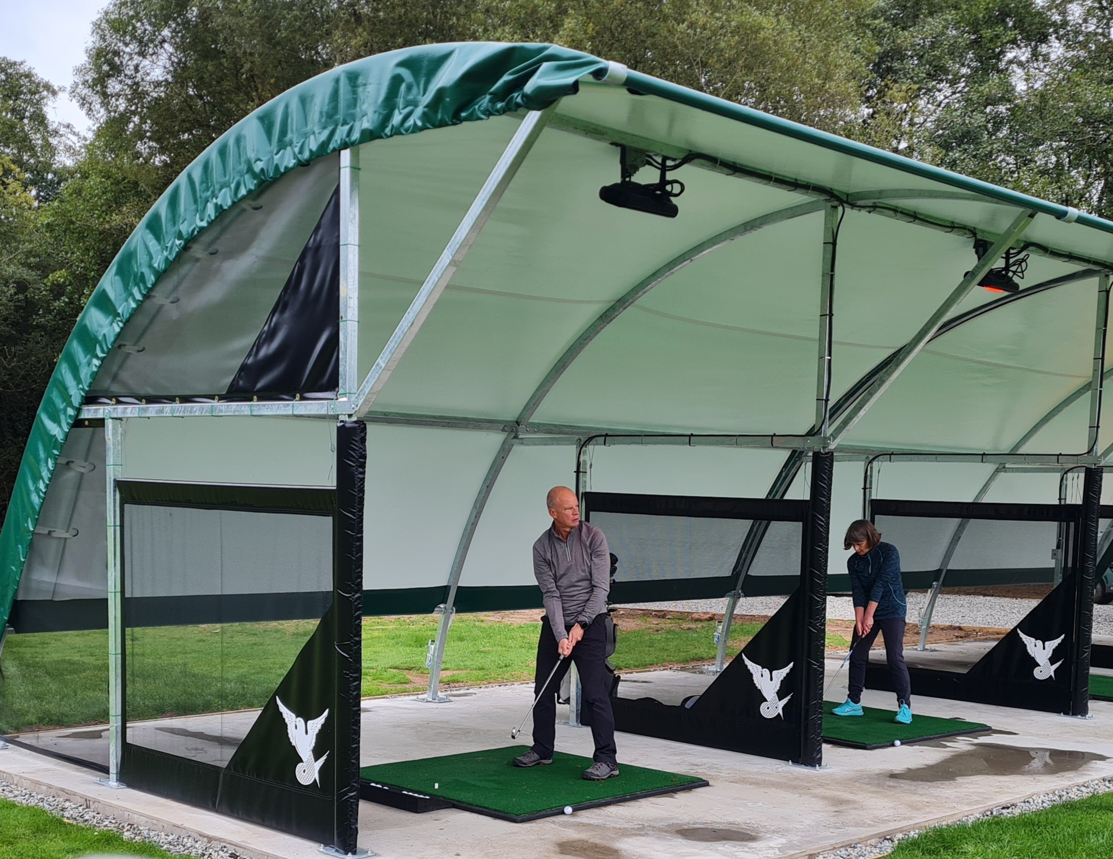 The new all-weather driving range at Bovey Castle  features four heated bays for year-round practice 