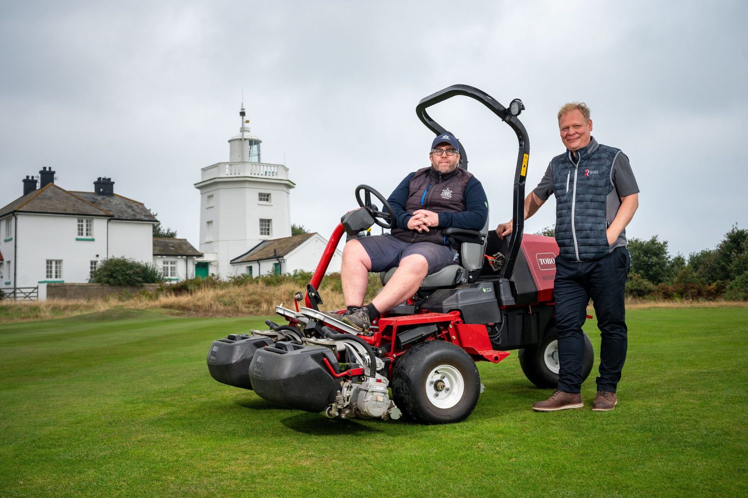 Royal Cromer’s Course Manager Mark Heveran, seated, with Reesink’s Danny Lake with one of the club's three new Toro eTriFlex 3370 electric mowers.