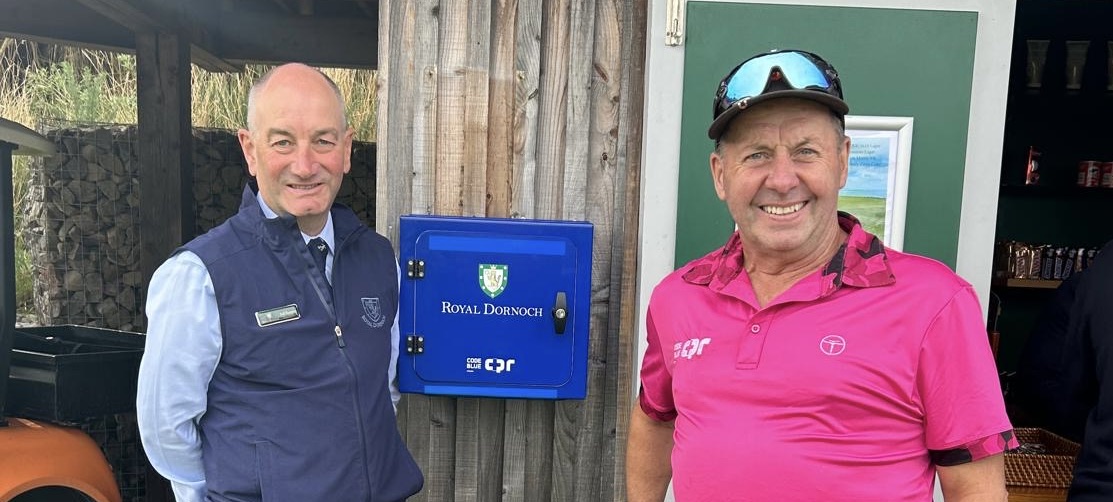 Royal Dornoch's Neil Hampton with defibrillator campaigner David Sullivan and the new Code Blue Box