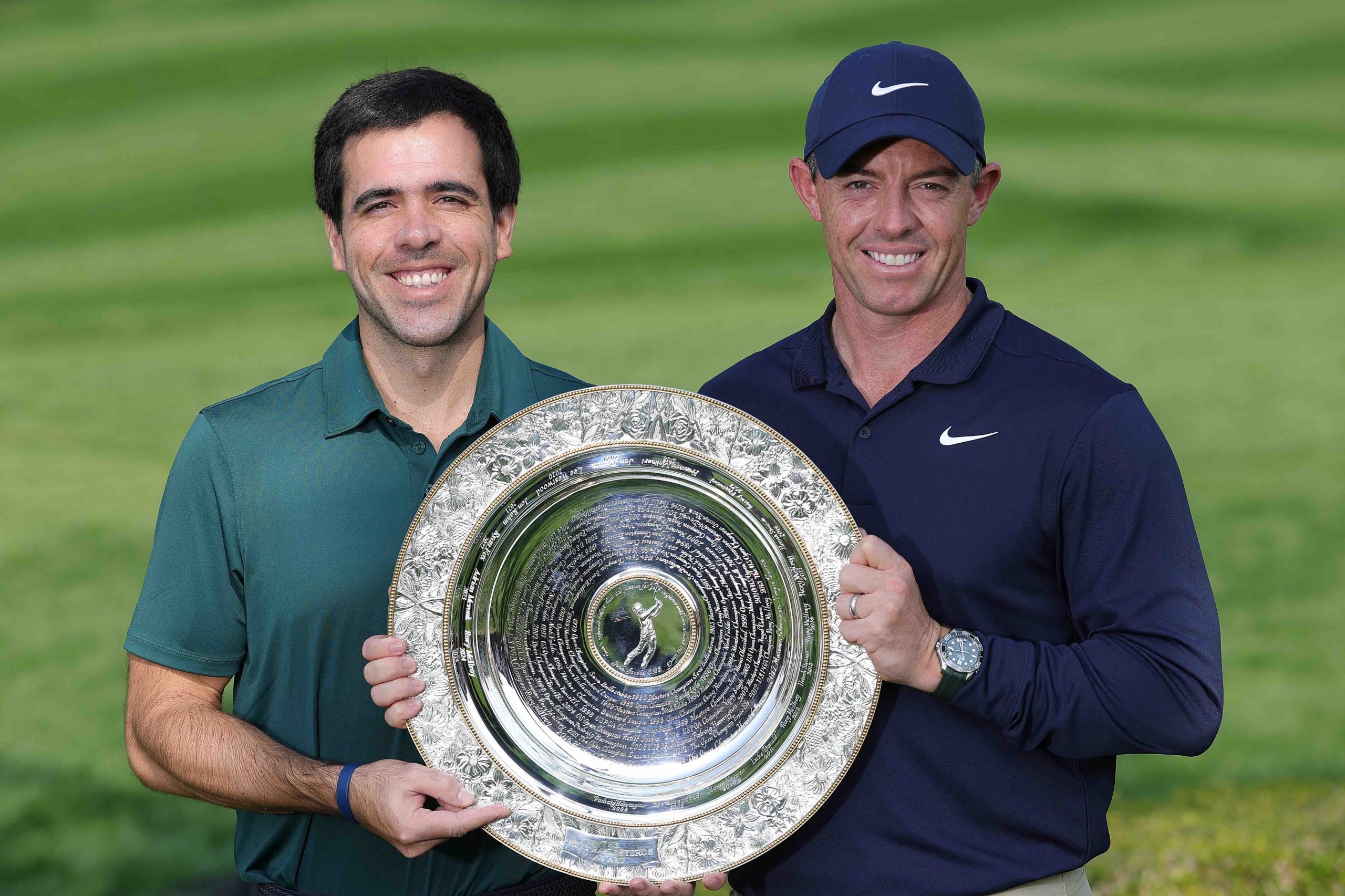 Javier Ballesteros presents Rory McIlroy with the Seve Ballesteros Award for the 2024 DP World Tour Players' Player of the Year