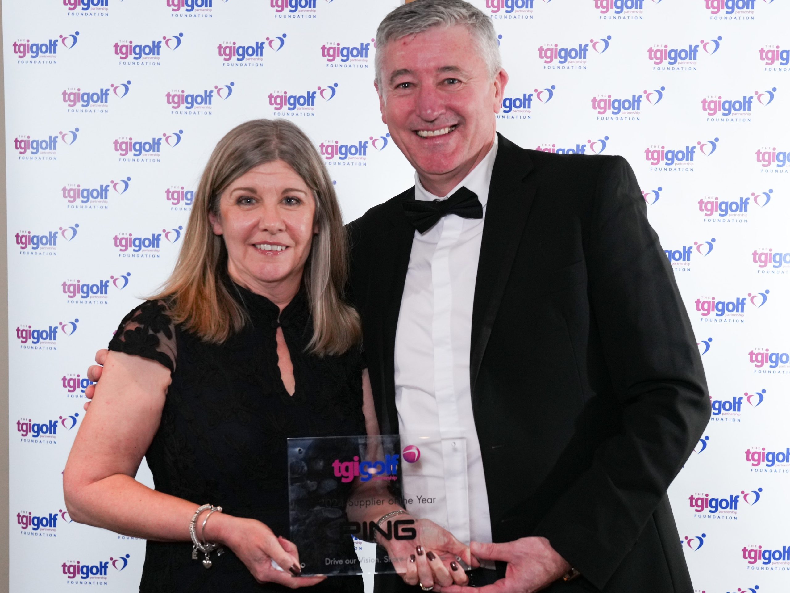 PING Managing Director Lisa Lovatt receives the award from Gullane GC PGA Pro and TGI Golf Board member Alasdair Good