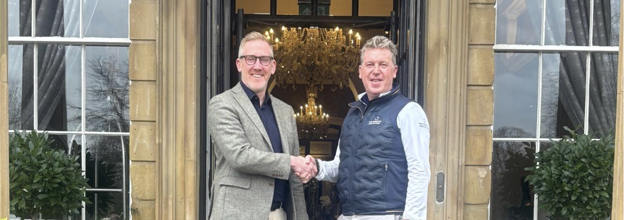 Keith Pickard and Duncan Rougvie shake hands on the new partnership between QHotels and the PGA at Oulton Hall