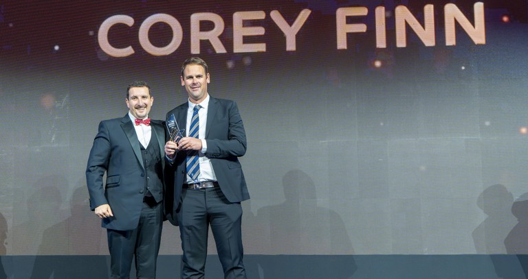 Corey Finn (right) with trophy