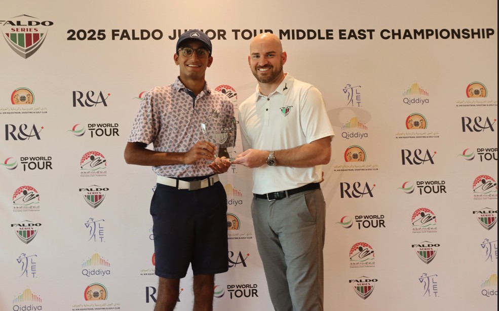 Raghav Gulati (left) - the overall event winner, receiving his prize from Matthew Faldo